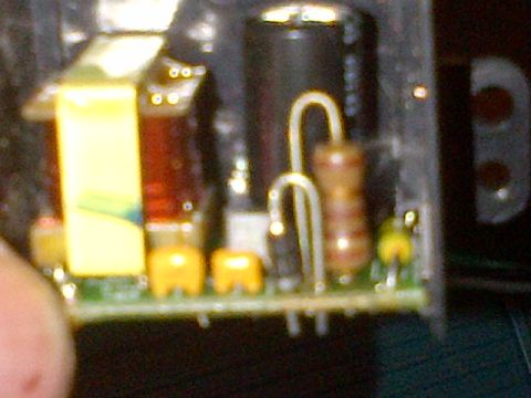 2003 Ford F-150 - Electronic circuit board with various components visible.