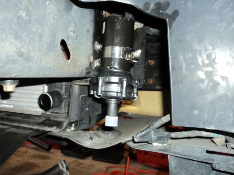 2004 Mercury Grand Marquis - An aftermarket electric water pump is installed on the vehicle's frame.