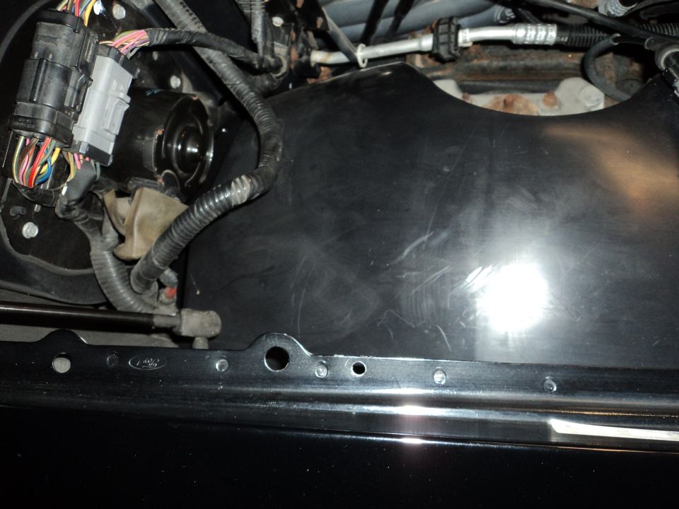 engine bay wiring harness and black plastic shroud