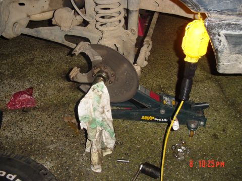 1987 Ford Bronco - taking the spindles off again after i put the dust sheilds on to wrong sides!! the rotor was draging on the sheilds due to them being on th…