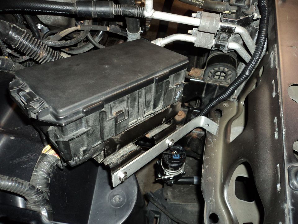 Engine bay fuse box and wiring with SuperMotors logo