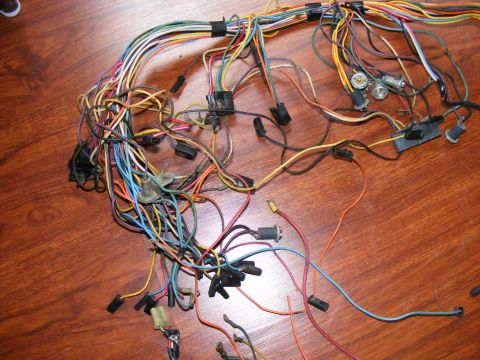 Bundle of old car wires, connectors, and some light bulbs