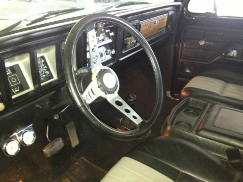 1978 Ford Bronco - Interior view of a 1978 Ford Bronco, highlighting the dashboard, steering wheel, and seating.