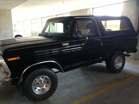 1978 Ford Bronco - This 1978 Ford Bronco is captured in a 3/4 front view, its classic SUV design.