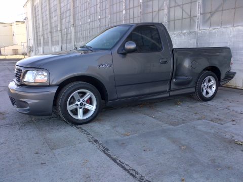 2003 Ford F-150 - This 2003 Ford F-150 Lightning pickup truck is shown from a 3/4 front angle.