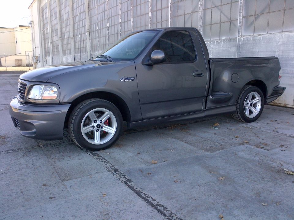 Gray 2003 Ford F-150 Lightning pickup truck, 3/4 front view
