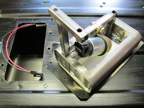 1976 Chevrolet Corvette - A fuel pump assembly is shown installed in a vehicle's fuel tank area, with wiring ready for connection.