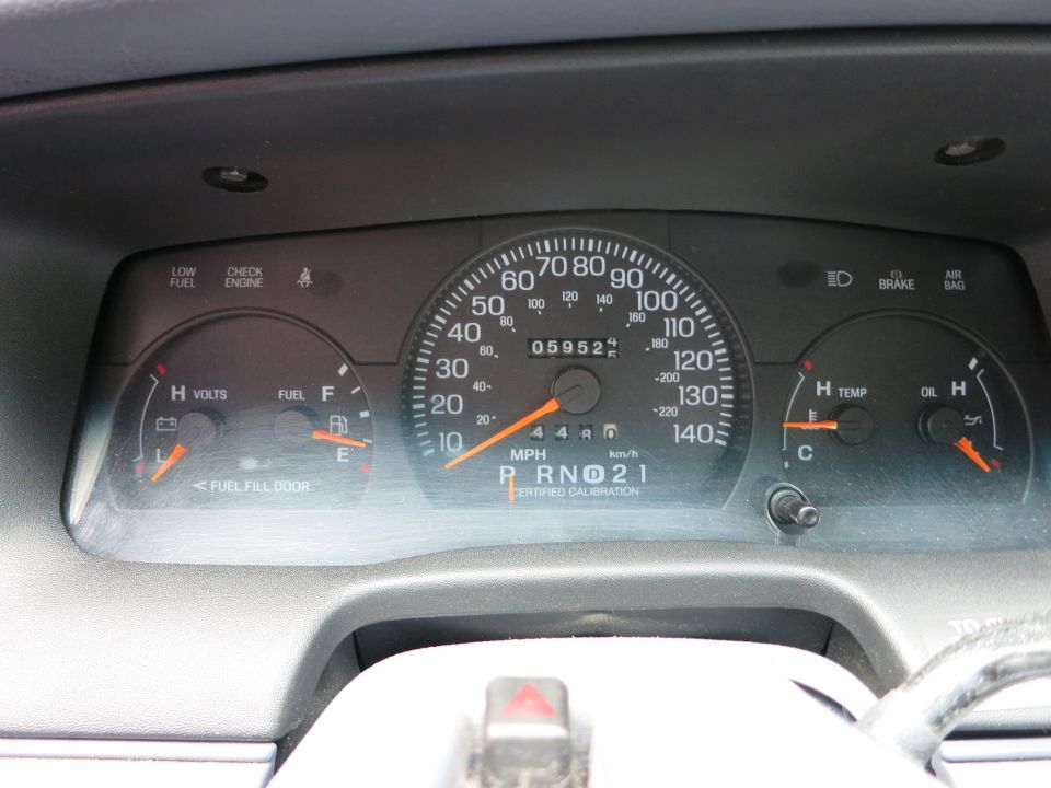 Dashboard gauges with odometer showing 05952, speedometer up to 140 MPH