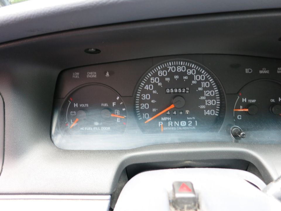 1991 Ford Crown Victoria LTD dashboard with speedometer, fuel gauge, and voltmeter