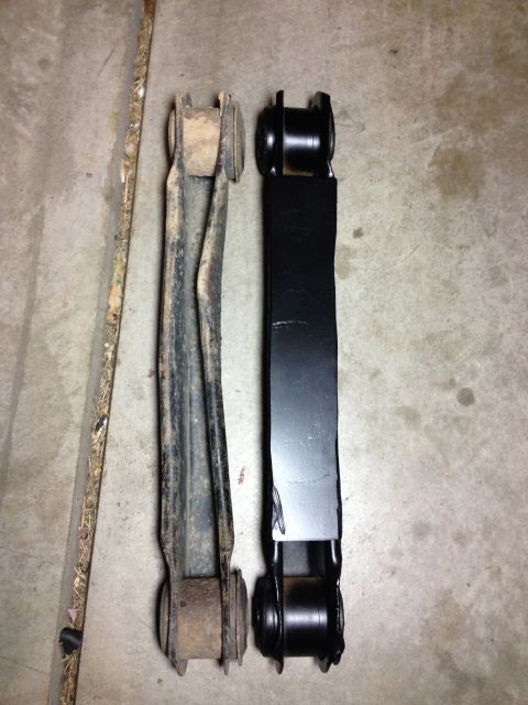 2005 Jeep Wrangler - Comparison of a used control arm with a new replacement part.