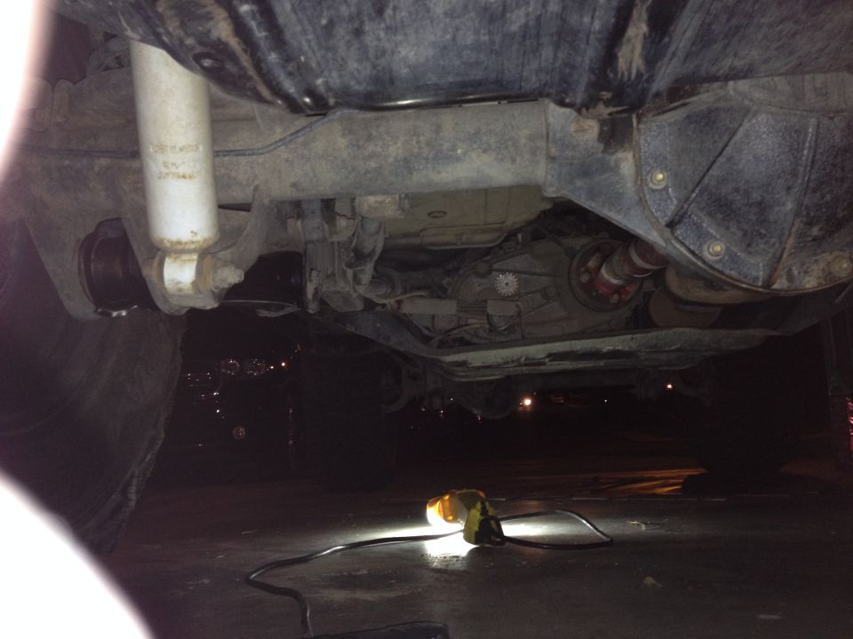 Underside of a 2005 Jeep Wrangler showing the drivetrain and suspension components