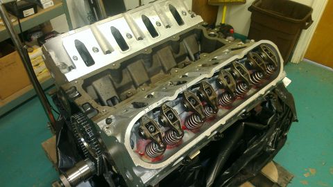 2005 Chevrolet Suburban - Close-up view of an engine block's valve train assembly, with rocker arms and springs visible.