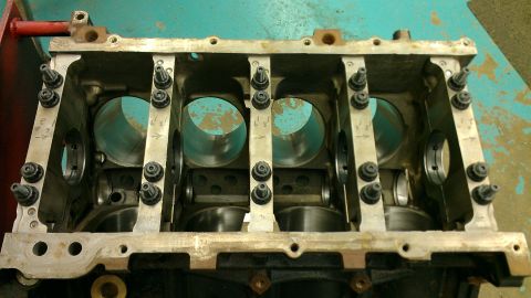 2005 Chevrolet Suburban - Close-up view of an engine block, showing the cylinder bores and main bearing caps.