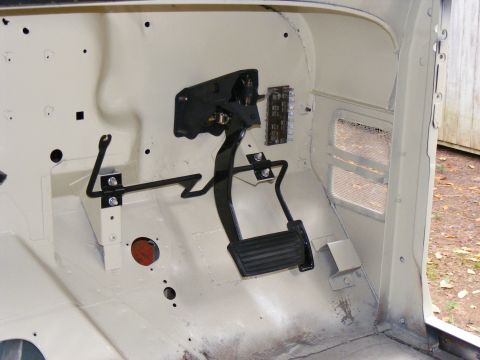 1978 Ford Bronco interior showing pedals and fuse box