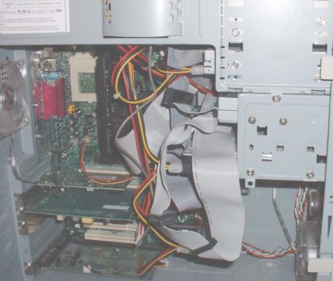1986 Ford Bronco - Internal components of a desktop computer, including motherboard, RAM, and wiring.