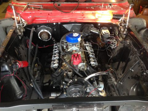 1964 Ford Fairlane - Engine bay of a vehicle, showing the V8 engine components and wiring.