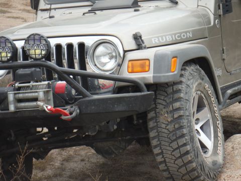 2005 Jeep Wrangler - This 2005 Jeep Wrangler Rubicon is equipped with a winch and aggressive off-road tires, ready for challenging terrain.