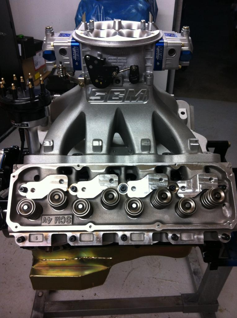 SEM intake manifold and cylinder head with visible SCM 4V casting