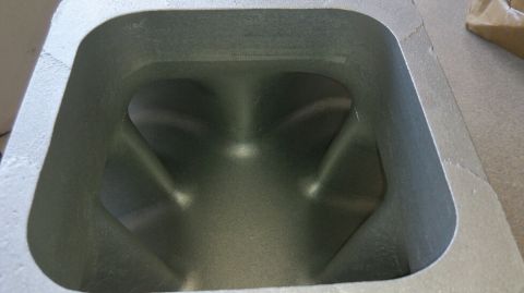 1972 Ford Ranchero - Close-up view of an engine intake port, showing its internal shape and a website logo.