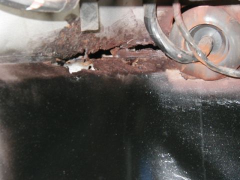 1985 Ford Bronco - passenger side floor pan holes. i plan on cutting out the rust and migging in some new patches should work