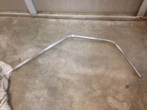 1972 Ford Ranchero - This chrome trim piece appears to be a car part, possibly for an older model.