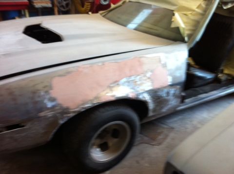 1972 Ford Ranchero - This 1972 Ford Ranchero is undergoing bodywork, with primer and bondo visible on the fender.
