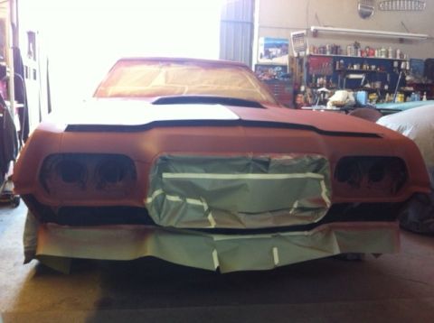 1972 Ford Ranchero - This 1972 Ford Ranchero is in the process of being prepped for a new paint job, with its front end covered in masking tape and primer.