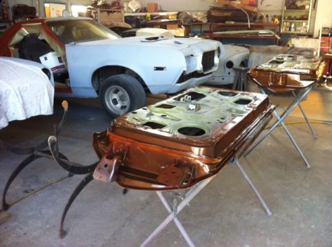 1972 Ford Ranchero - Car doors undergoing restoration in a workshop, with a 1972 Ford Ranchero body visible in the background.