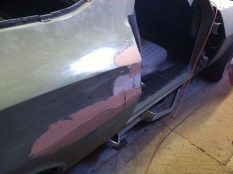 1972 Ford Ranchero - Bodywork on a 1972 Ford Ranchero, focusing on the door and interior repairs.