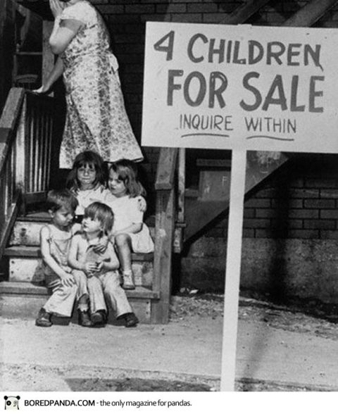2006 Ford E350 - A stark historical photograph depicts children on steps with a sign advertising them for sale, with a woman in the background.
