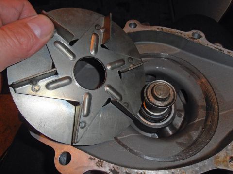 1990 Ford Bronco - Close-up of a water pump impeller and its housing, showing the internal components and seal.