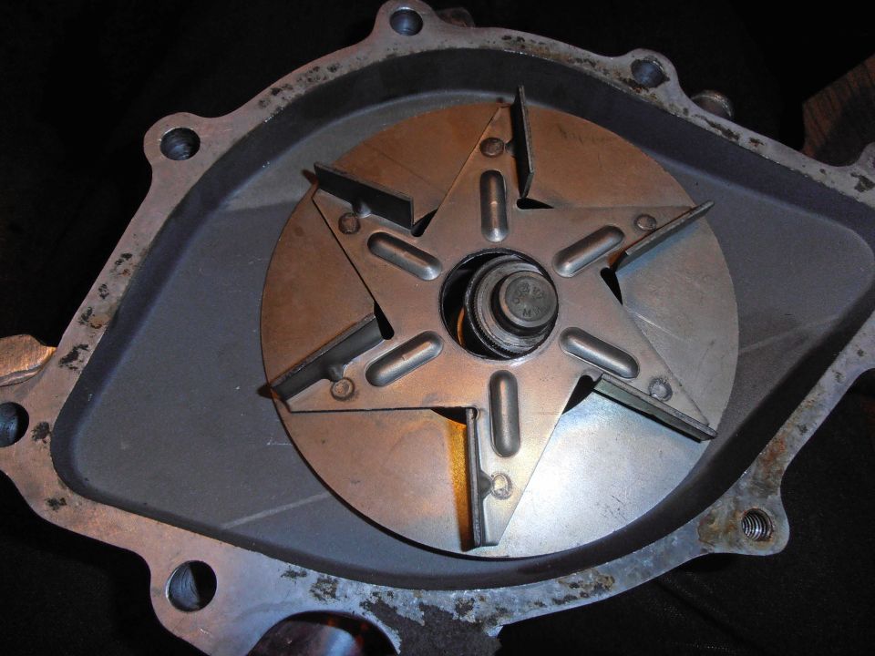 Close-up of a water pump impeller with six blades