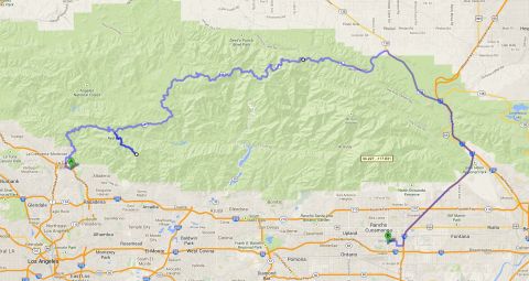 1995 Ford Taurus - A map displays a route from urban areas into a mountainous region, likely for navigation or tracking.