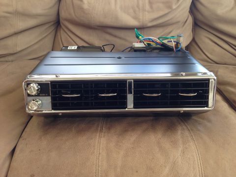 1964 Ford Fairlane - This is an aftermarket car air conditioner unit with dual vents and chrome trim.