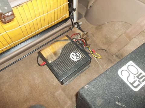 1995 Ford Bronco - Aftermarket car audio equipment is visible inside the vehicle's cabin.