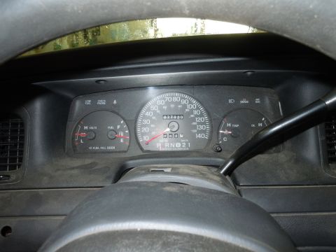 2001 Ford Crown Victoria - Interior view of a 2001 Ford Crown Victoria's dashboard, displaying the odometer reading of 77,920 miles.