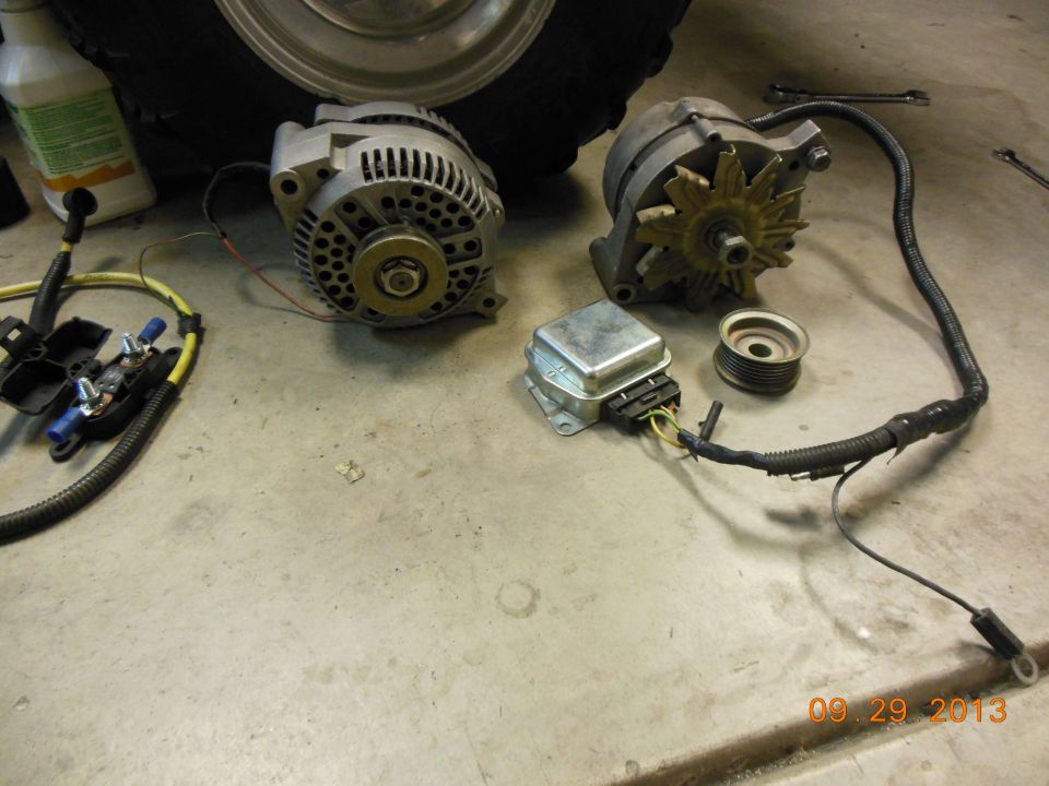 Two alternators and voltage regulator on concrete floor