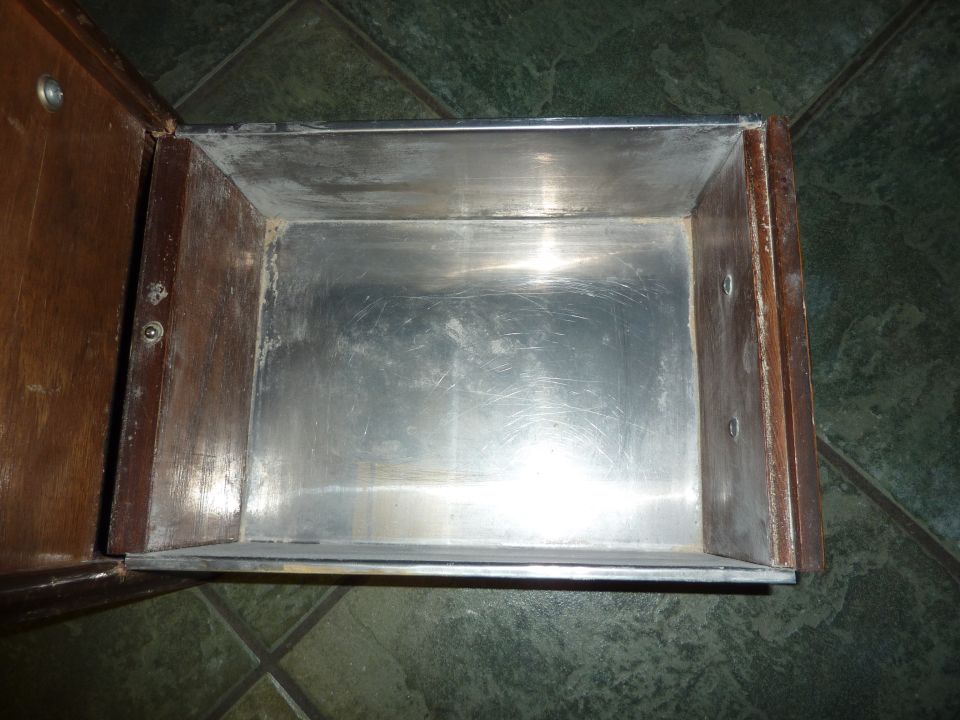 Metal-lined wooden drawer interior, Supermotors.net logo visible