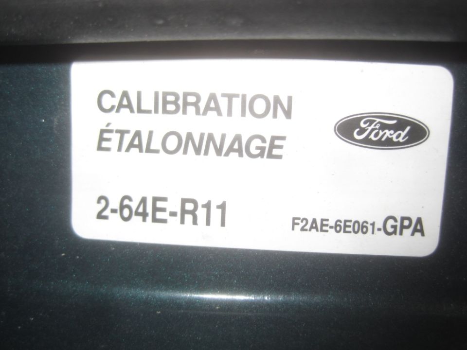 Ford calibration sticker with text CALIBRATION ÉTALONNAGE, part numbers 2-64E-R11 and F2AE-6E061-GPA