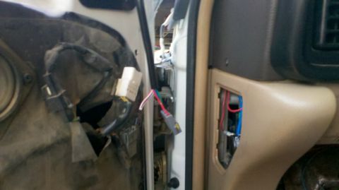 1997 Dodge 3500 - View of exposed wiring and connectors inside a vehicle's door panel.