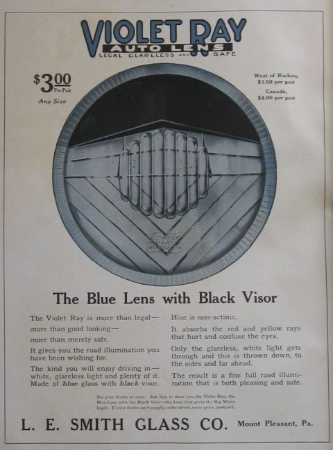 1915 Ford Model T - Advertisement for Violet Ray Auto Lens with Black Visor, highlighting its legal and safe glareless illumination.