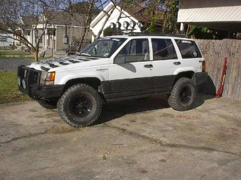 1993 Jeep Grand Cherokee - Drive way shot with new lift and tires..