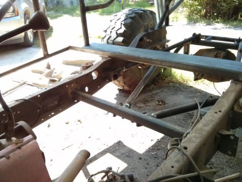 1986 Ford Bronco - Custom off-road vehicle frame and suspension components are visible in this photo.