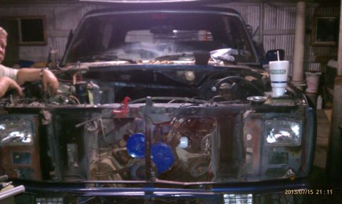 1983 Ford Bronco - This 1983 Ford Bronco is in a state of repair, with its front end disassembled to expose the engine bay.