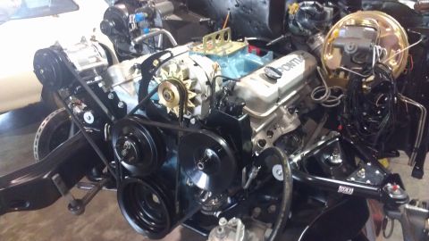 1972 Pontiac Trans Am - Pontiac V8 engine assembly, likely from a 1972 model, with "PONTIAC" valve covers visible.