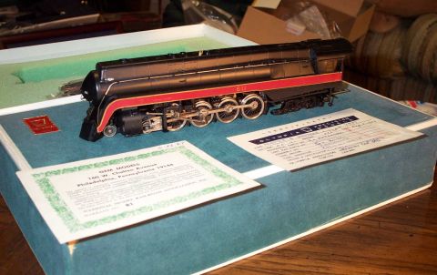 1998 Ford Crown Victoria - One of my pride and joy locomotives. That is solild brass, not plastic. The brass tender is in the background.