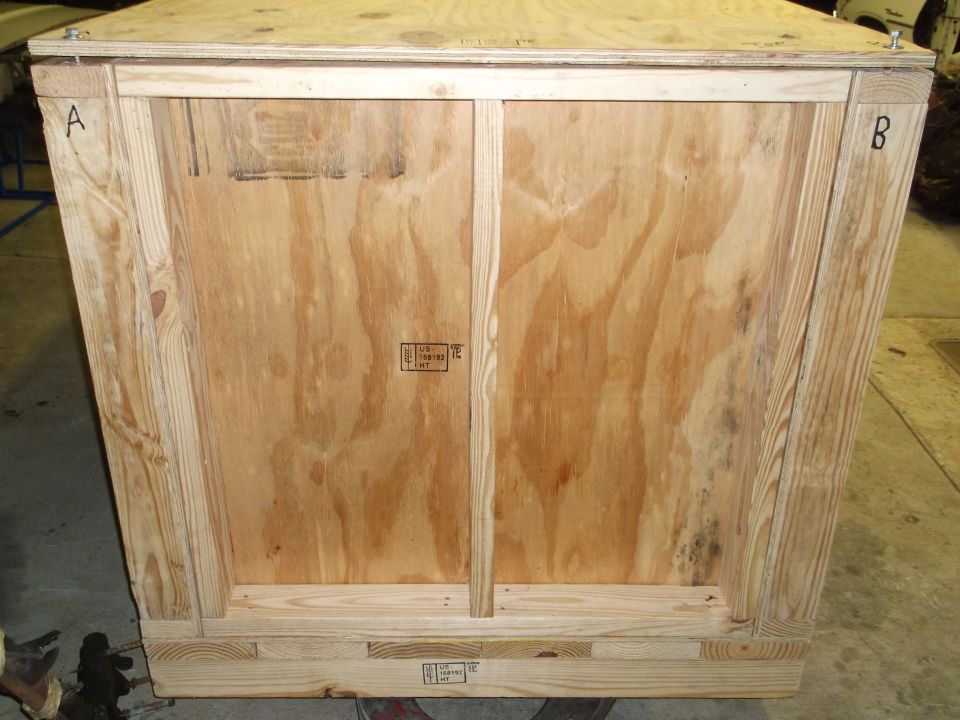 Wooden shipping crate with labels A and B, and some stamped markings