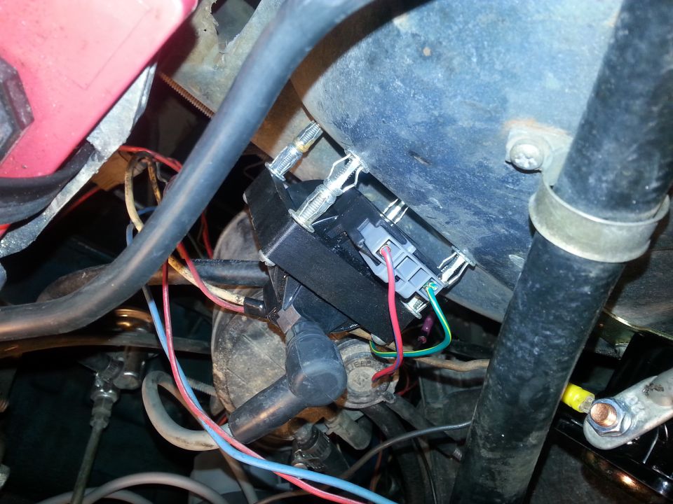 Engine ignition module with red and green wires