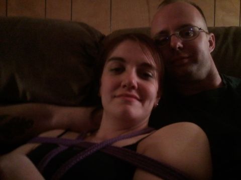 1996 Ford Bronco - A couple is relaxing on a couch, captured in a selfie.