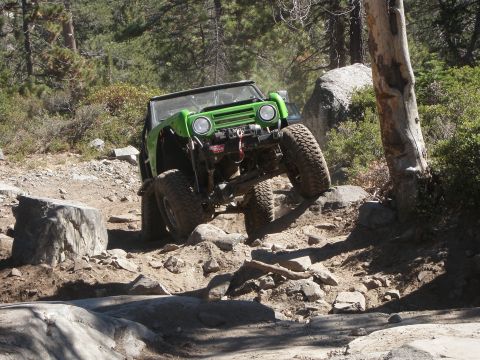 1961 International Scout 800 - Green 1961 International Scout 800 navigates a challenging rocky terrain.